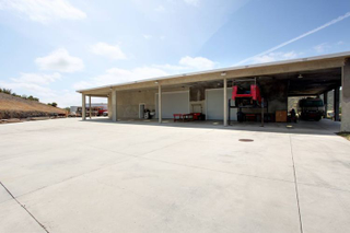 Illustration for article titled 40-car garage for sale, house included